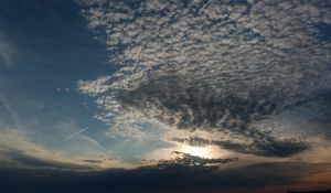 Preview wallpaper clouds, air, shadows, sea, evening, cloudy