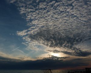 Preview wallpaper clouds, air, shadows, sea, evening, cloudy