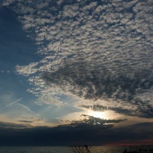 Preview wallpaper clouds, air, shadows, sea, evening, cloudy
