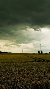 Preview wallpaper clouds, field, gloomy, sky, gray