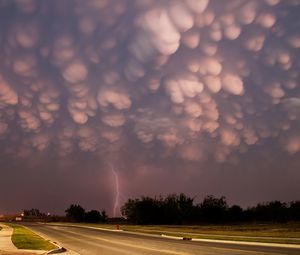 Preview wallpaper clouds, heavy, storm, lightning, bad weather, road, asphalt, lamps