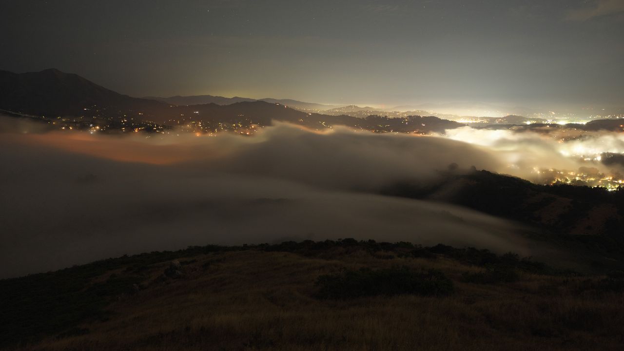 Wallpaper clouds, hills, fog, lights, evening