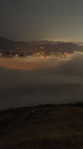 Preview wallpaper clouds, hills, fog, lights, evening