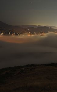 Preview wallpaper clouds, hills, fog, lights, evening