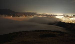 Preview wallpaper clouds, hills, fog, lights, evening