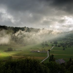 Preview wallpaper clouds, hills, forest, nature, houses