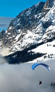 Preview wallpaper clouds, parachute, mountains, sky