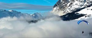 Preview wallpaper clouds, parachute, mountains, sky