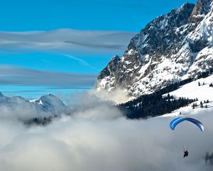 Preview wallpaper clouds, parachute, mountains, sky