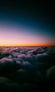 Preview wallpaper clouds, porous, sunset, sky horizon, twilight, moon, above clouds