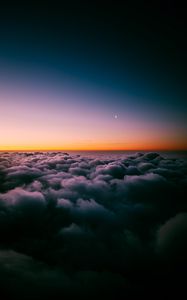 Preview wallpaper clouds, porous, sunset, sky horizon, twilight, moon, above clouds