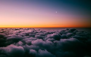 Preview wallpaper clouds, porous, sunset, sky horizon, twilight, moon, above clouds