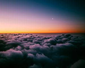 Preview wallpaper clouds, porous, sunset, sky horizon, twilight, moon, above clouds