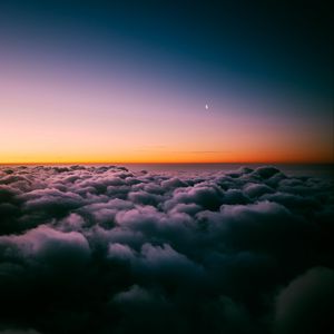 Preview wallpaper clouds, porous, sunset, sky horizon, twilight, moon, above clouds