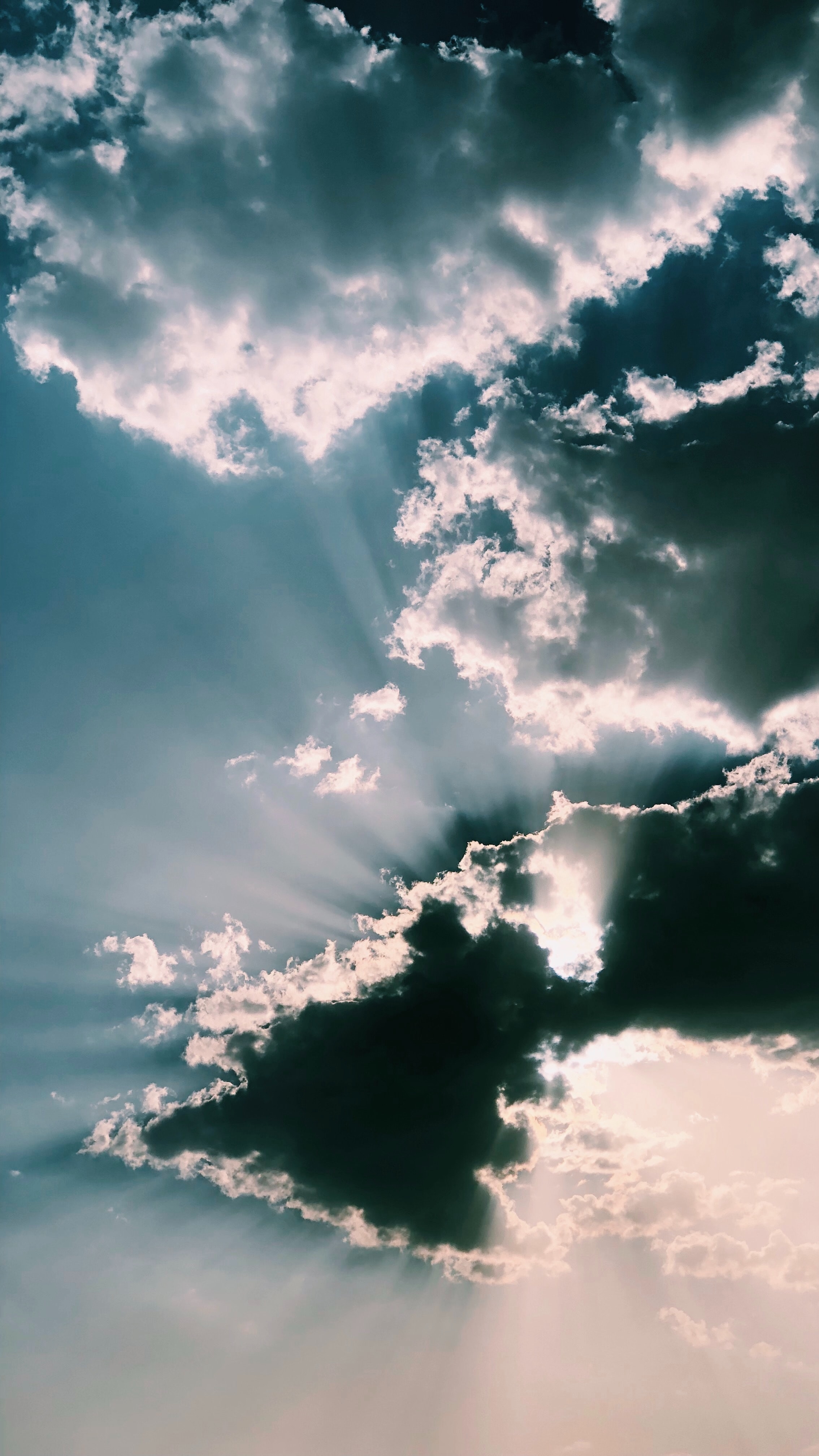 Download wallpaper 2268x4032 clouds, rays, sky hd background