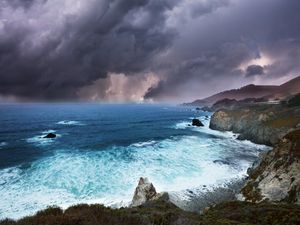 Preview wallpaper clouds, rocks, coast, sea, foam