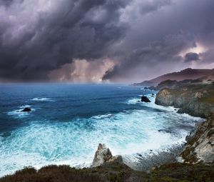 Preview wallpaper clouds, rocks, coast, sea, foam