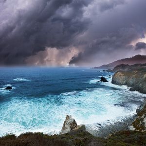 Preview wallpaper clouds, rocks, coast, sea, foam