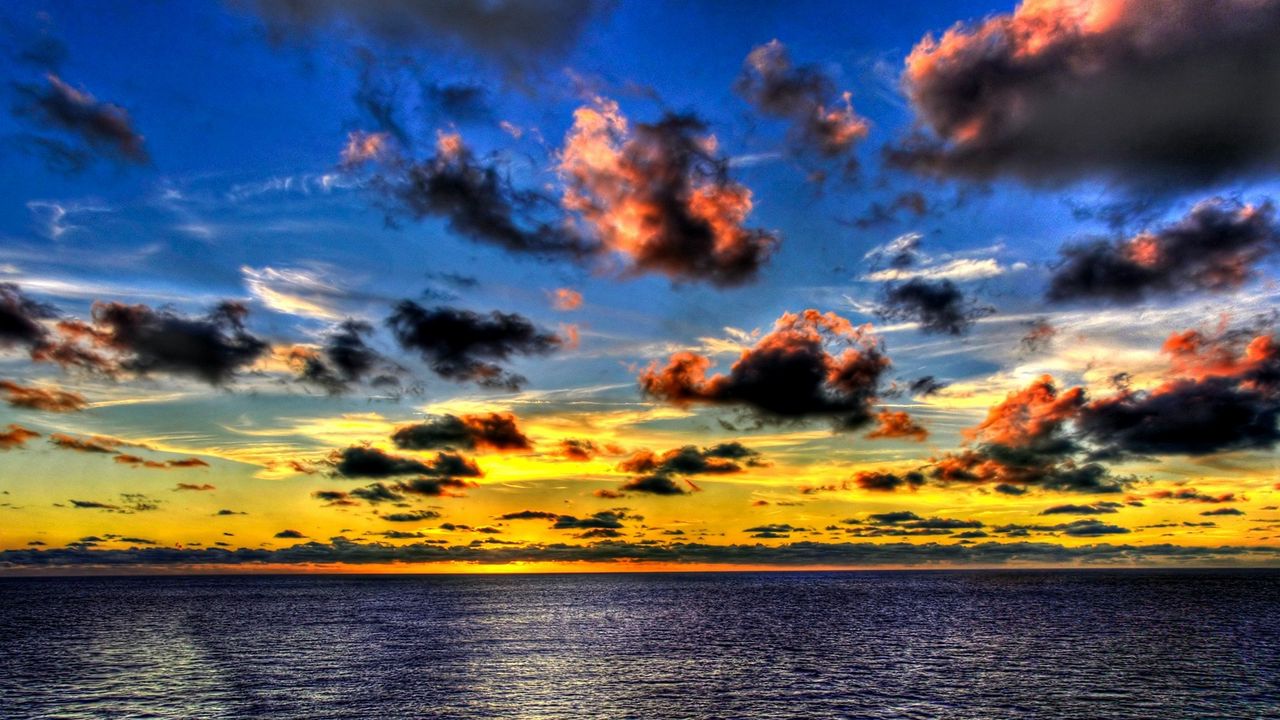 Wallpaper clouds, sea, sky, evening, shadows, yellow, dark blue, colors