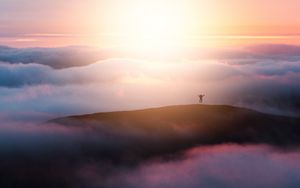 Preview wallpaper clouds, silhouette, jump, happiness, sunset