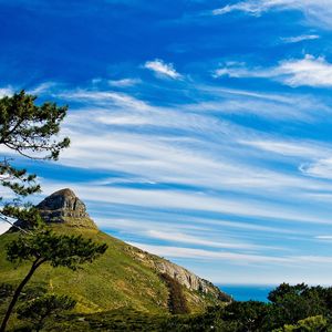 Preview wallpaper clouds, sky, blue, purity, mountain, trees, freshness