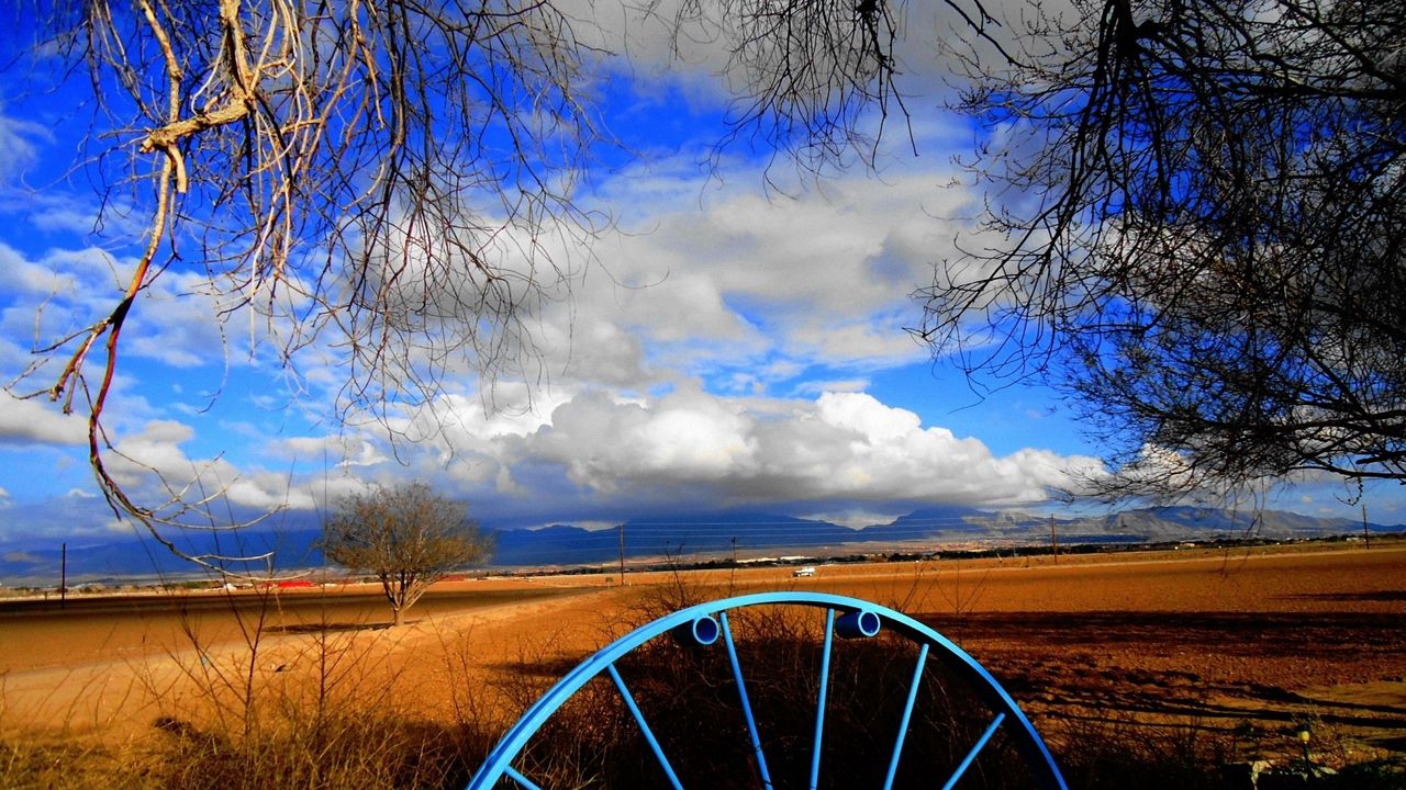 Wallpaper clouds, sky, field, wheel, iron