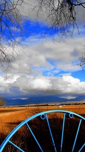 Preview wallpaper clouds, sky, field, wheel, iron