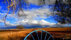 Preview wallpaper clouds, sky, field, wheel, iron