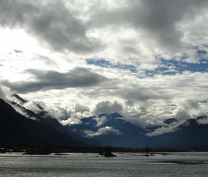 Preview wallpaper clouds, sky, mountains, heavy, water