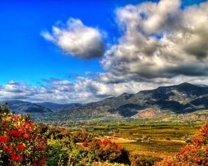 Preview wallpaper clouds, sky, mountains, flowers, paints, vegetation, grass