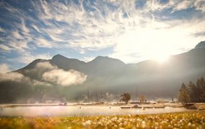 Preview wallpaper clouds, sky, mountains, ease, coast, light, sun, boats