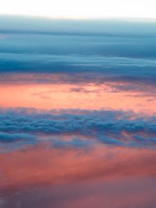 Preview wallpaper clouds, sky, porous, sunlight, sunset, sunrise