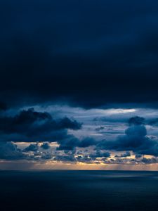 Preview wallpaper clouds, sky, rays, sea, dark