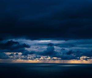 Preview wallpaper clouds, sky, rays, sea, dark
