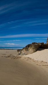 Preview wallpaper clouds, sky, stones, sand, coast, strips