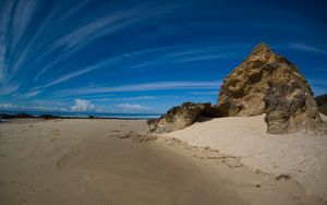 Preview wallpaper clouds, sky, stones, sand, coast, strips