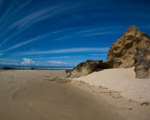 Preview wallpaper clouds, sky, stones, sand, coast, strips