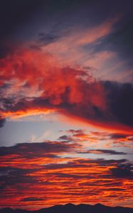 Preview wallpaper clouds, sky, sunset, red, porous, mountains, fiery