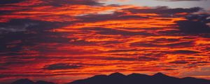 Preview wallpaper clouds, sky, sunset, red, porous, mountains, fiery