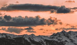 Preview wallpaper clouds, sky, sunset, porous, mountains, peaks