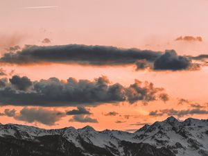 Preview wallpaper clouds, sky, sunset, porous, mountains, peaks