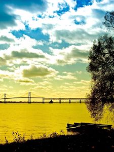 Preview wallpaper clouds, sky, water, coast, tree, bridge, morning, colors