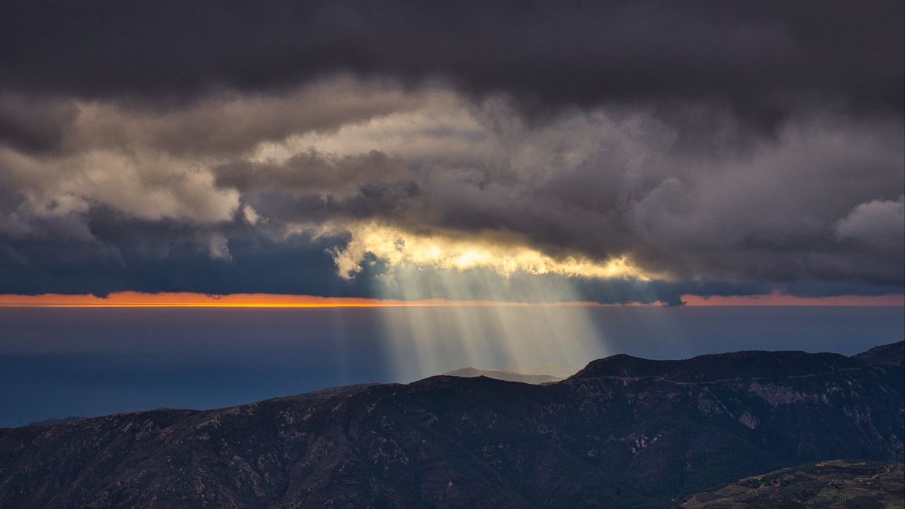 Wallpaper clouds, sun, rays, mountains, landscape