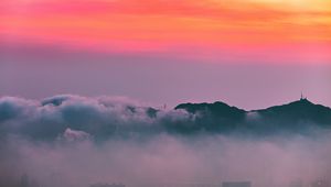 Preview wallpaper clouds, sunrise, mountain, dawn, fog, city