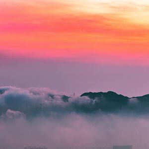 Preview wallpaper clouds, sunrise, mountain, dawn, fog, city