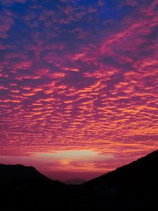 Preview wallpaper clouds, sunset, hills, porous, evening