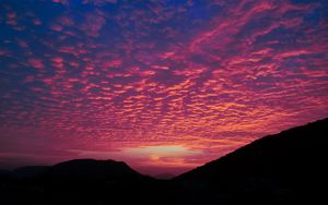 Preview wallpaper clouds, sunset, hills, porous, evening