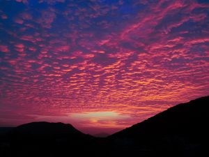 Preview wallpaper clouds, sunset, hills, porous, evening