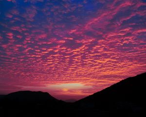 Preview wallpaper clouds, sunset, hills, porous, evening