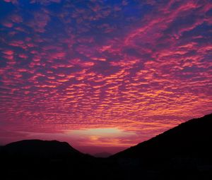 Preview wallpaper clouds, sunset, hills, porous, evening